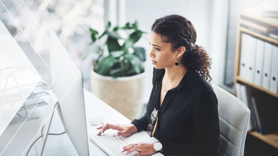 AR head working at her desk.