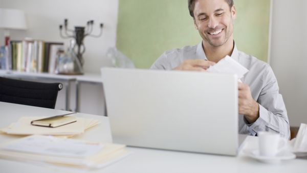 business owner using print+mail payments