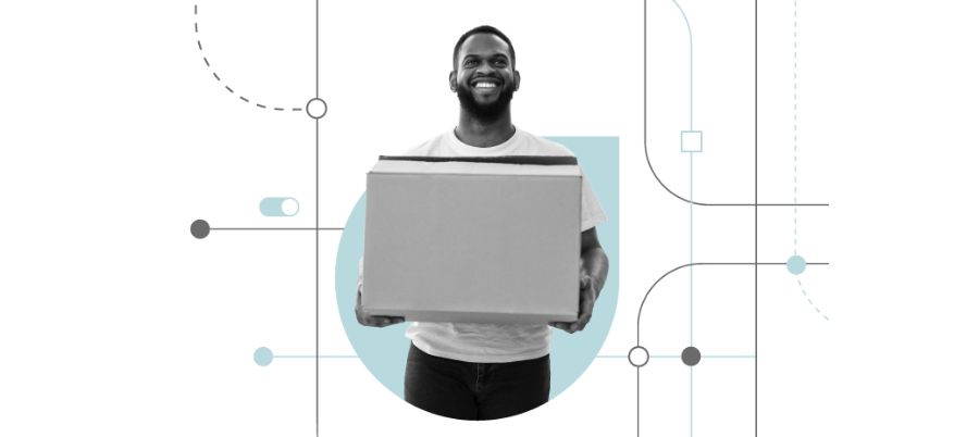A man holding a moving box