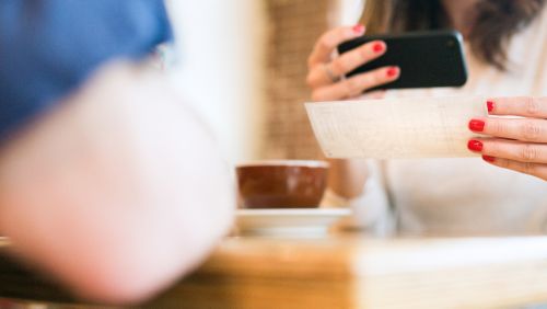 A woman using remote deposit capture.
