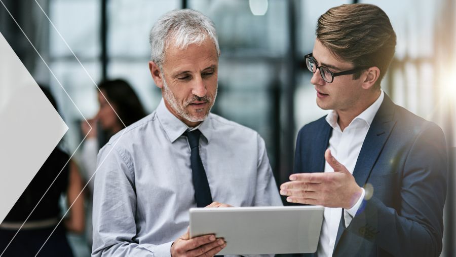 Two men discussing The Payoffs, Pain Points and Potential of Generative AI