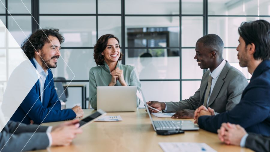 A group of coworkers at a meeting table 