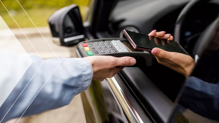 Person using their smartphone to make a payment.