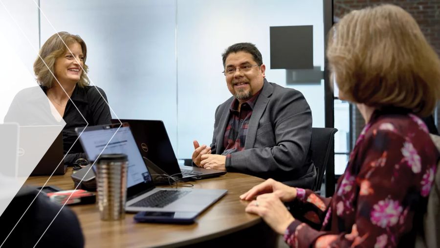 Group of colleagues discussing treasury management