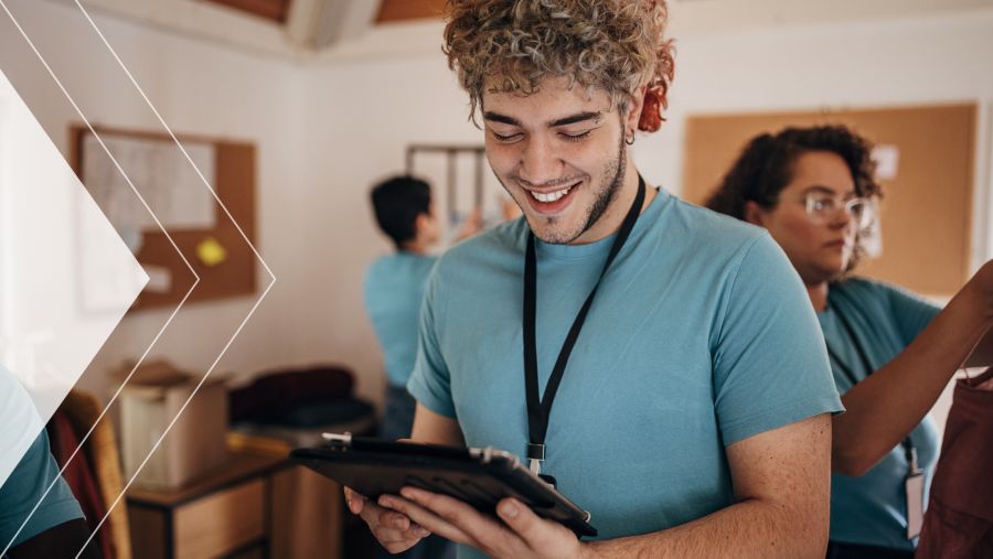 Nonprofit employee reviewing donations on a tablet.